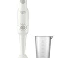 a blender that is sitting next to a measuring cup