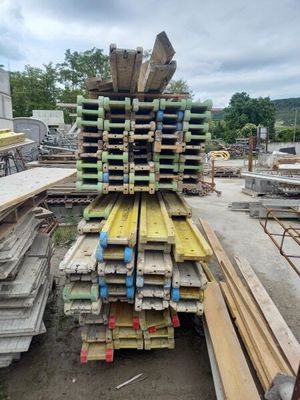 a large pile of lumber stacked on top of each other