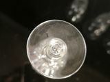 a glass of wine that is sitting on a table