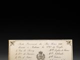 un vieux document écrit posé sur une table