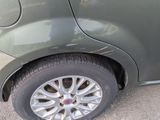 a close up of a car ' s tire on the street