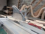 a picture of a table saw in a workshop
