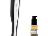 a close up of a bottle of liquid next to a hair clipper