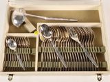 silverware in a case with spoons, spoons, and spoon spoons