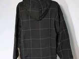 black and white checkered hoodie on a mannequin dummy