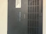 a close up of a laptop with the back panel removed