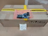 a cardboard box with a circuit board inside of it
