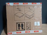 a cardboard box that has a picture of a pair of shoes on it