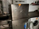 a washer and a dryer in a small kitchen