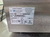 an image of a stainless steel box with a label on it