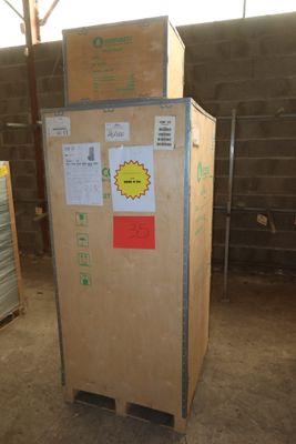 boxes stacked on top of each other in a warehouse