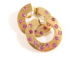 gold plated and pink crystal earrings on a white background