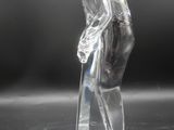 an image of a glass figurine of a man holding a golf club