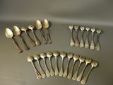 a lot of silver spoons and spoon spoons on a table