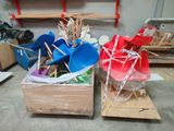 two boxes with different items in them sitting on the floor