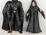 two action figures of darth vader and darth vader from star wars