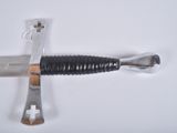a knife that is laying on a table