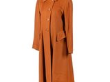 an orange coat with buttons on a mannequin mannequin mannequin mannequin mannequin mannequin mannequin mannequin mann