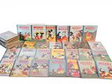 mickey mouse story book collection with a lot of books on it