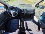 the interior of a car with a steering wheel and a dashboard