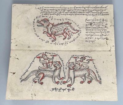 an old manuscript with a drawing of a dragon and a man riding on a horse