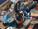 a picture of a table saw in a workshop