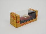 dinky toy car in a box on a white surface
