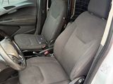 a car that has two seats in the back of it