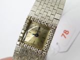 une montre-bracelet de femme ornée de diamants
