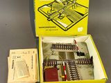 a box with a train set in it on a table