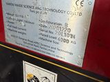 a picture of a machine that has a sign on it
