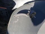 a close up of a helmet with a handle on it