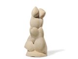 a small statue of a woman holding a baby