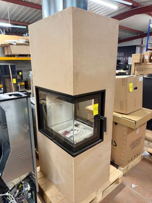 a very large stove in the middle of a room