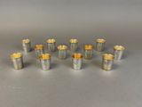 a set of six silverplated cups with gold rims