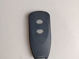 an image of a remote control on a white surface