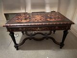 a coffee table with a brown and black design on it