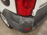 a close up of the rear end of a white van