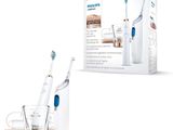 a box of toothbrushes and a glass of water