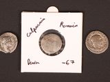 an image of a piece of paper with a picture of a roman coin on it