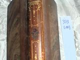 an old book on a table with a price tag on it