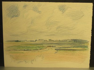 une photo d'un dessin représentant un paysage posé sur une table