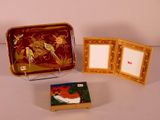 a picture of a picture frame and a picture of a bird on a plate