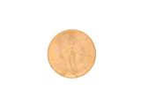 a close up of a gold coin on a white background