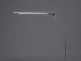 a white desk lamp on a grey background