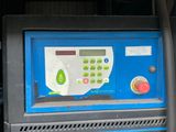 an image of a blue machine with buttons on it