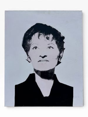 an image of a black and white photo of a woman ' s face