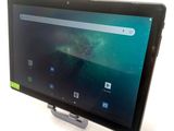 a tablet that is sitting on top of a stand