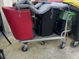 a cart with a lot of garbage on it