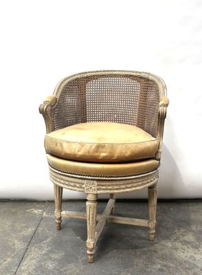 an image of a chair with a cushion on top of it